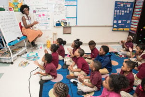 teacher reading to students